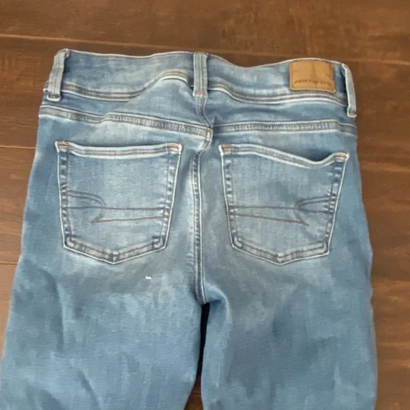 American Eagle Low Rise Bootcut Ripped Blue Jeans Size 0 - Picture 3 of 15